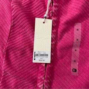 Pink buckle crop top, size small, new with tag.